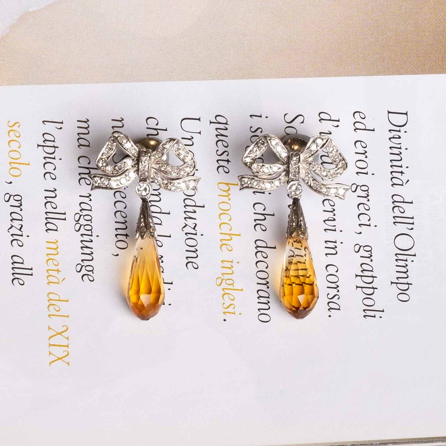 Diamond bow earrings with citrine quartz