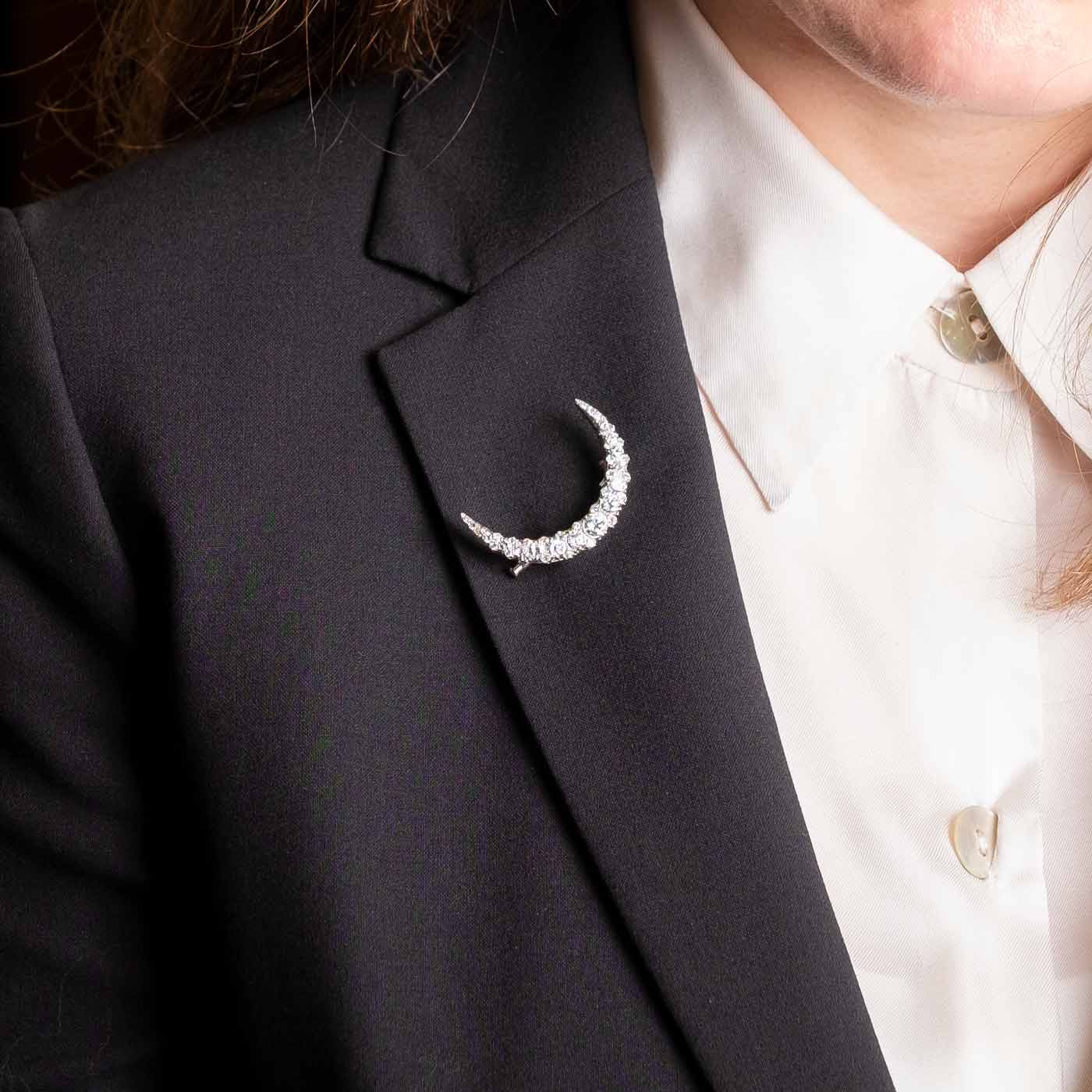 Crescent moon brooch with diamonds
