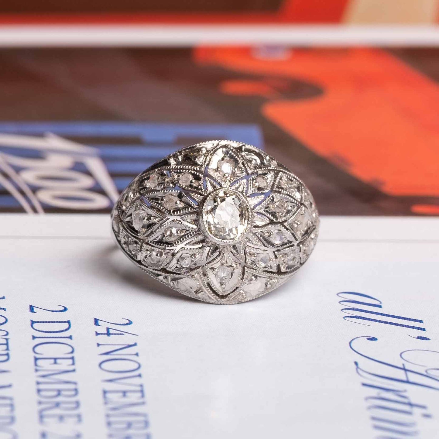 Deco period dome ring in platinum with diamonds