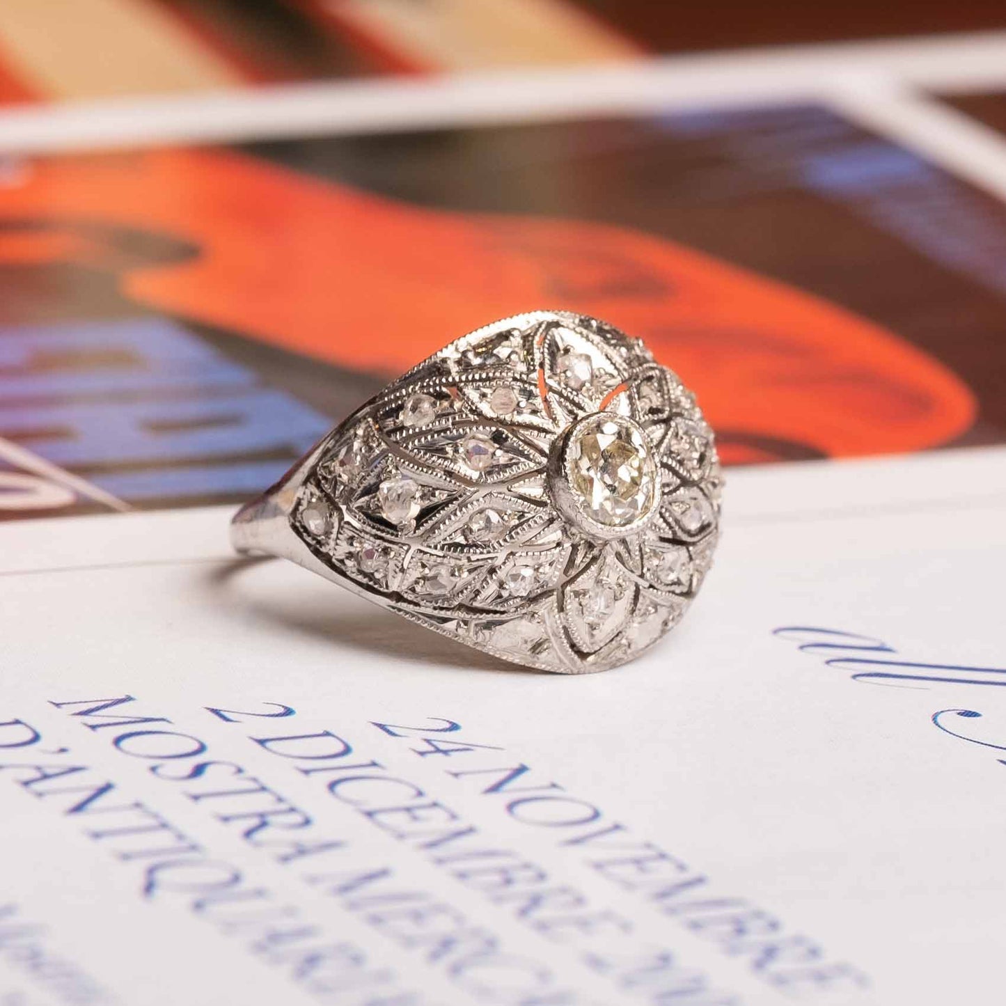 Deco period dome ring in platinum with diamonds