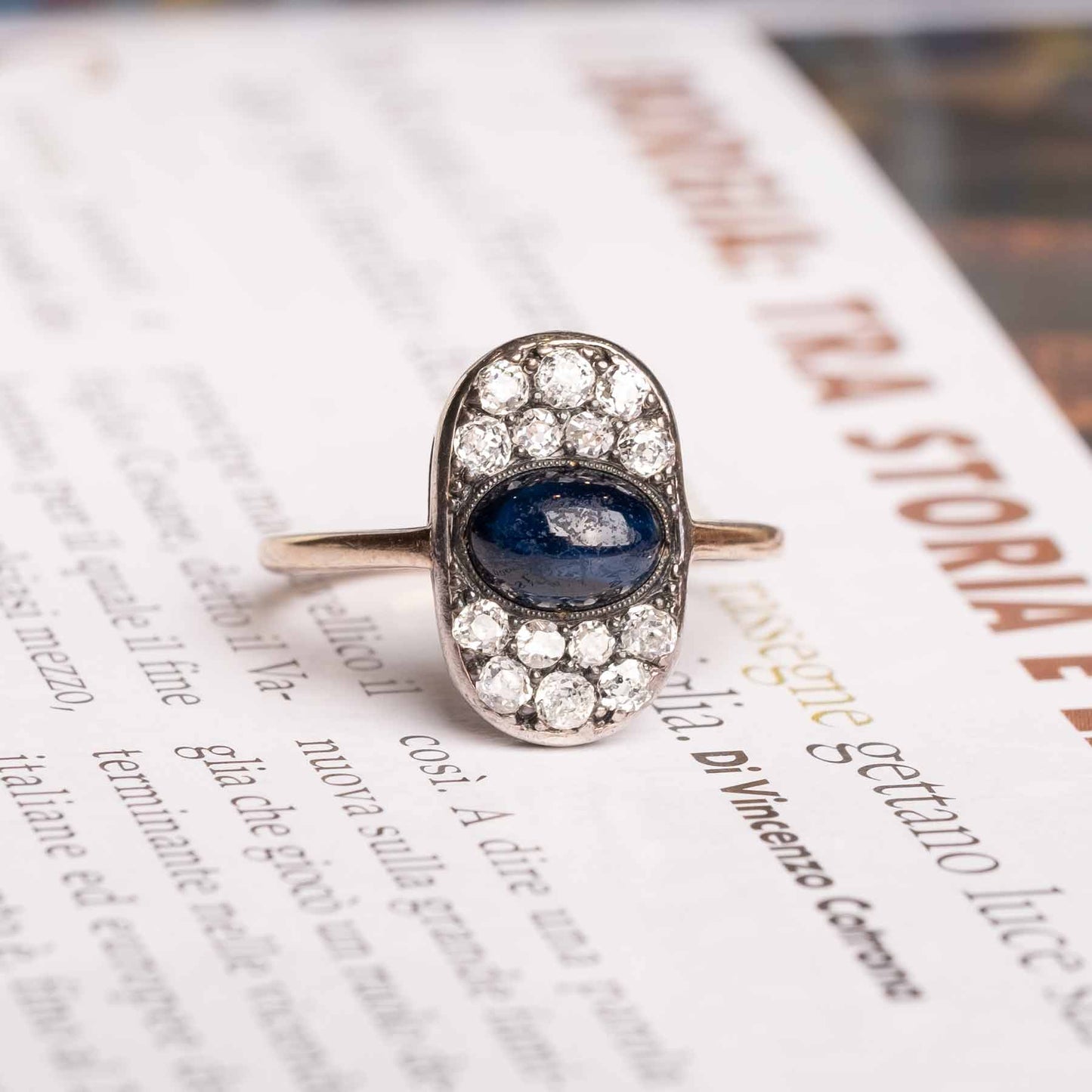 Deco ring with cabochon sapphire and diamonds