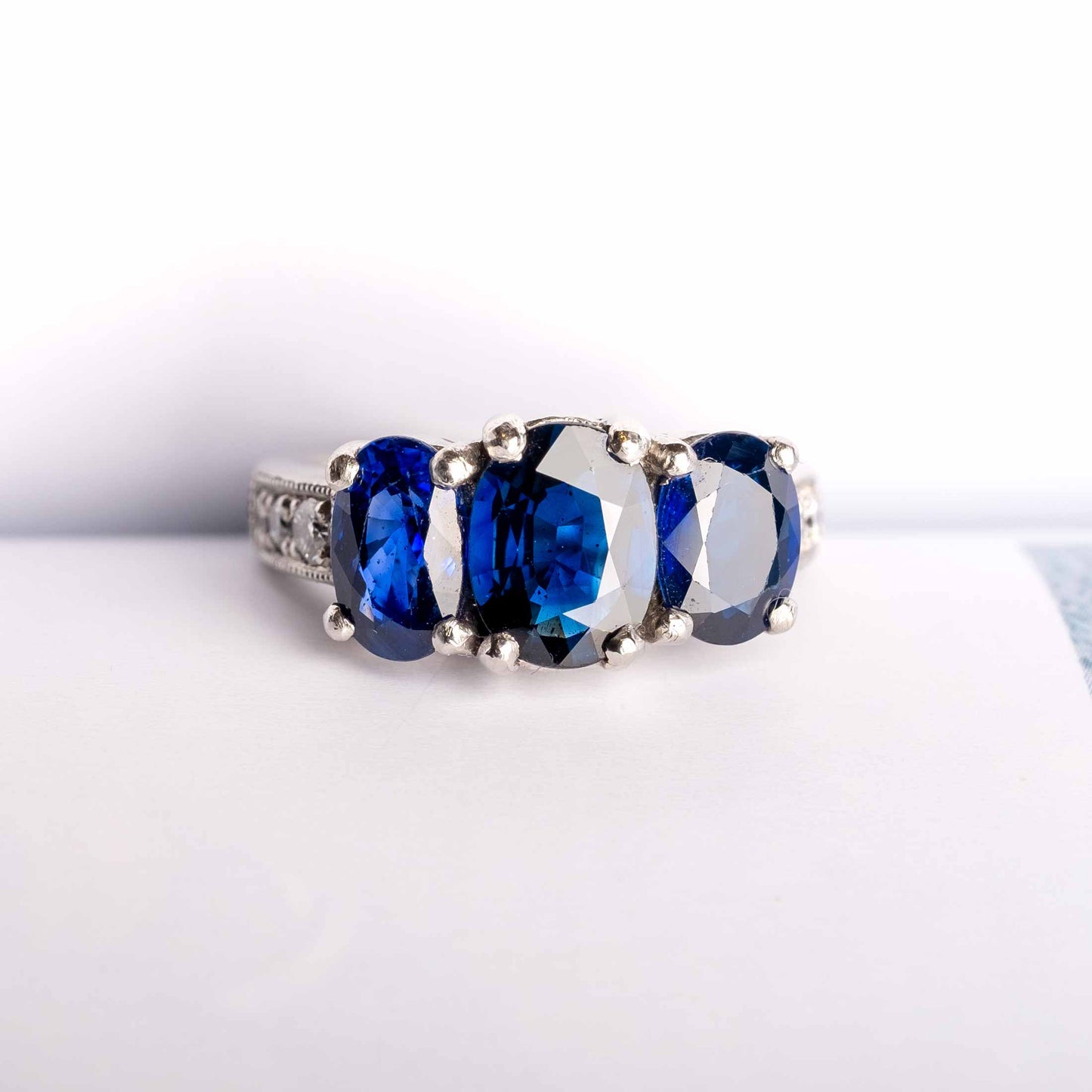 Vintage Platinum Ring with Natural Sapphire Trilogy and Diamonds