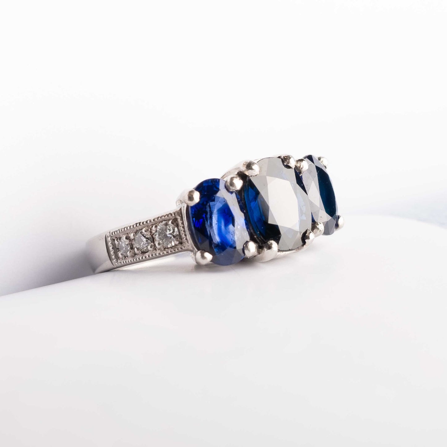 Vintage Platinum Ring with Natural Sapphire Trilogy and Diamonds