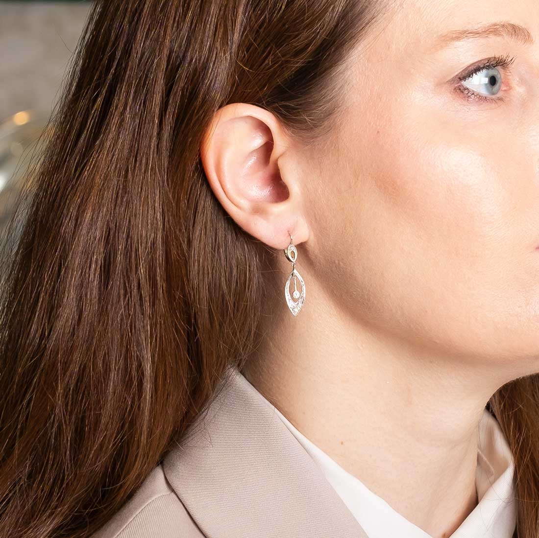 White gold and diamond drop earrings